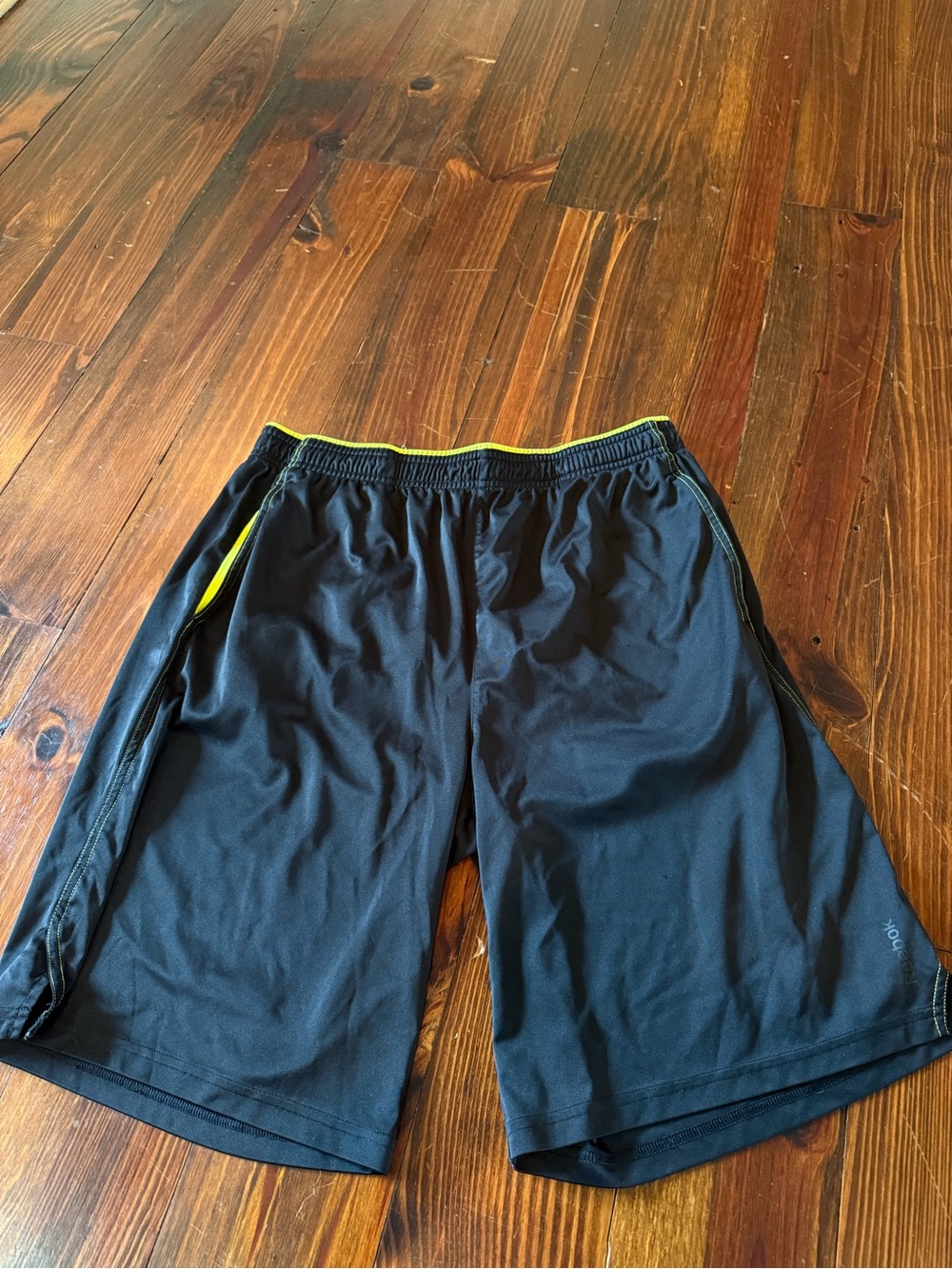 Reebok Black Athletic Shorts with Yellow Trim